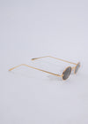  High-quality designer sunglasses in gold color with UV protection and fashion-forward design