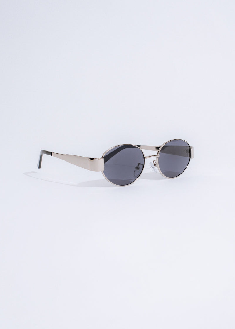Round silver sunglasses with reflective lenses and transparent frames for a chic look