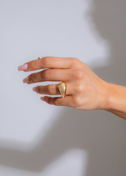  Hand model wearing Miss Me Ring Gold, showcasing its elegant and timeless design