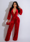 Stunning red velvet jumpsuit with a flattering silhouette and luxurious feel