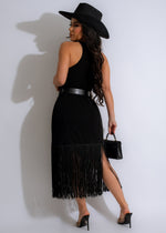 Elegant black midi dress with fringe detailing and impressionist design