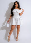 White ruffle romper with angelic design, perfect for a summer picnic
