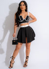 Sophisticated black short set with matching top and bottom Ideal for formal events or casual outings Sleek and stylish outfit for any occasion