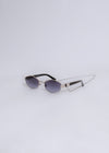 Stylish silver sunglasses with mirrored lenses and delicate frame details for a glamorous look