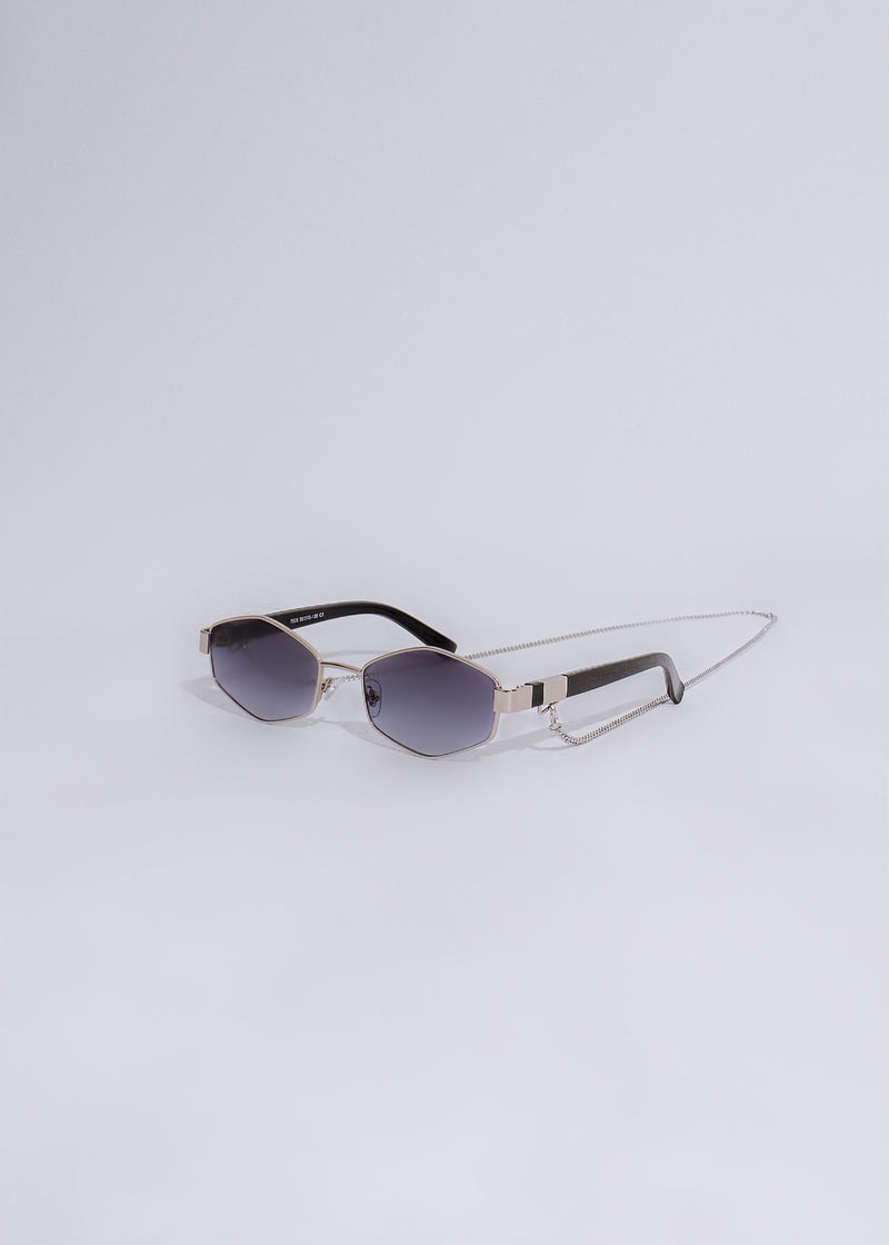 Stylish silver sunglasses with mirrored lenses and delicate frame details for a glamorous look