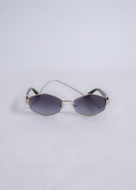  Fashionable silver sunglasses designed with a modern and chic aesthetic for a sophisticated style