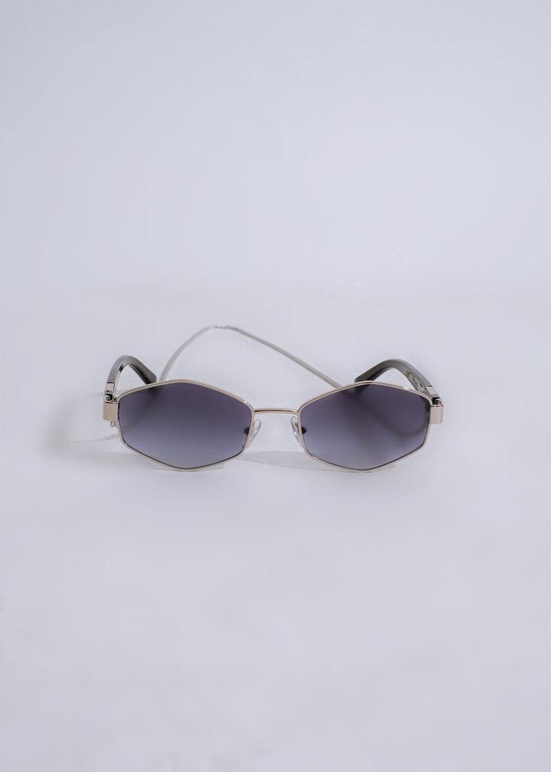  Fashionable silver sunglasses designed with a modern and chic aesthetic for a sophisticated style