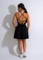 Black mini dress set with form-fitting silhouette, perfect for any occasion