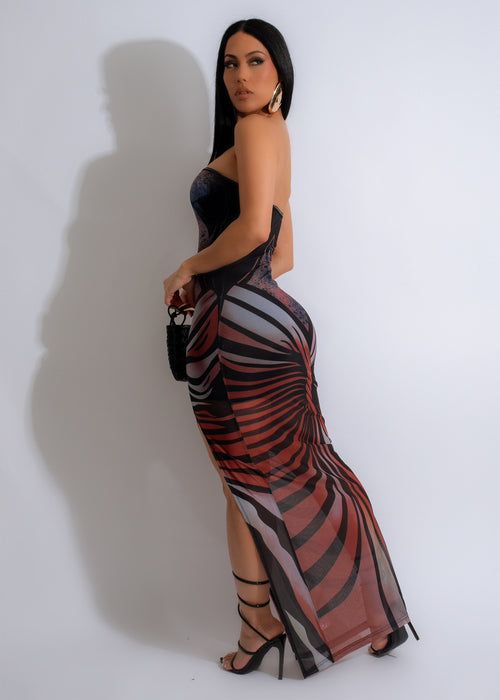 Stunning black Op-Art Odyssey Mesh Maxi Dress with flowing fabric and striking details