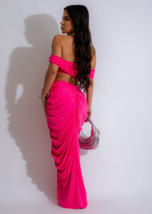 Two-piece set in a lovely pink color, featuring a ruched skirt and matching top