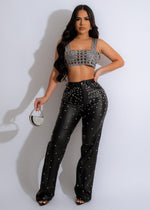 Faux leather black pants with diamond embellishments for a sleek look