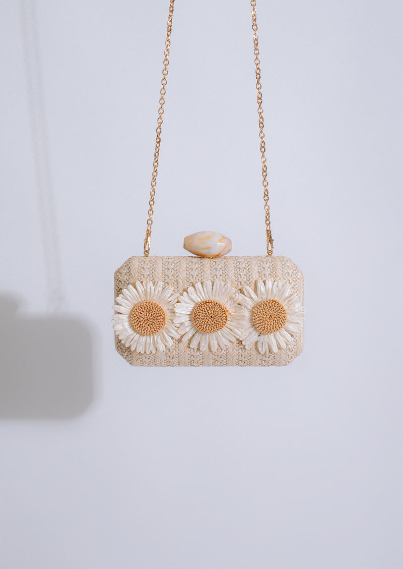 Daisy Love Clutch Nude: A versatile and stylish nude-colored clutch with a daisy design, perfect for any occasion