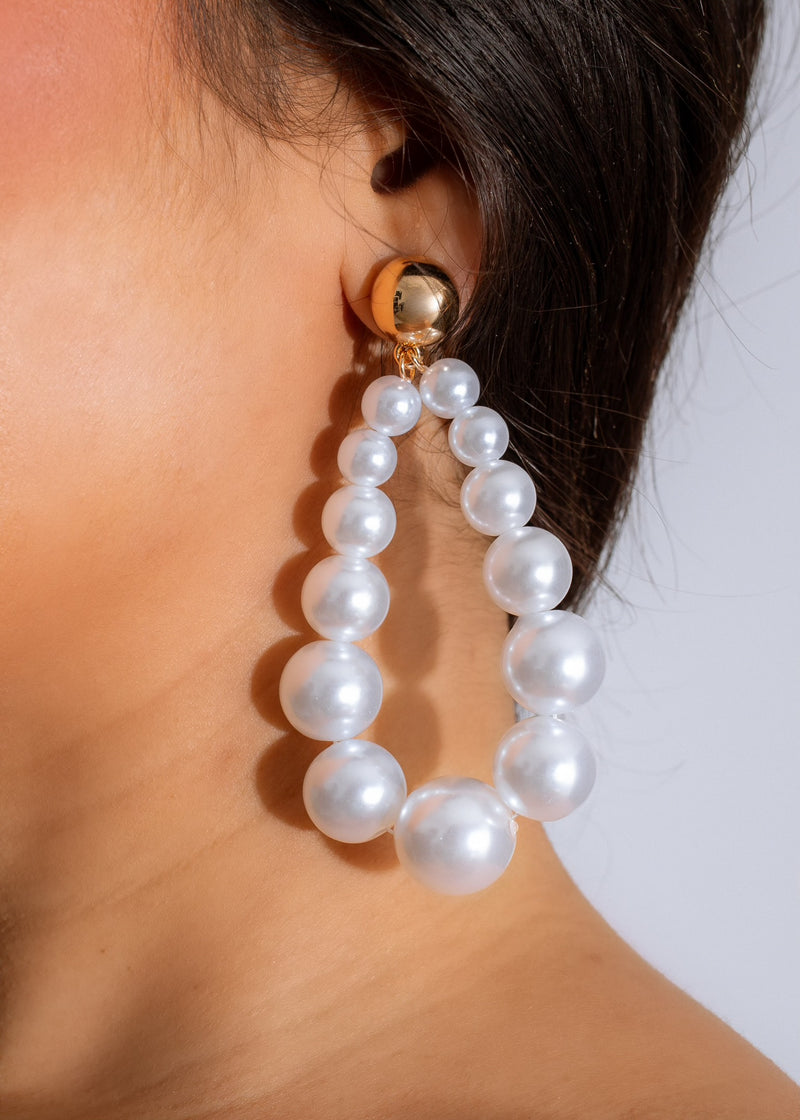 Stunning white statement earrings, the 'Give Me Everything Earring White' adds a touch of elegance and sophistication to any outfit