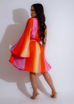  Sunset Day Pleated Mini Dress Orange, a charming and stylish sundress with a pleated design and a beautiful orange hue, perfect for casual or semi-formal occasions