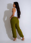Women's green cargo jogger pants with adjustable drawstring waist and ribbed cuffs