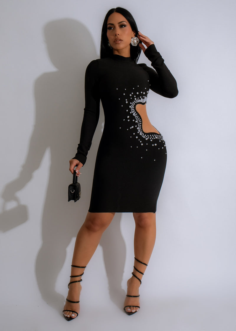 Flattering and form-fitting silhouette of the Addiction Bandage Pearls Mini Dress