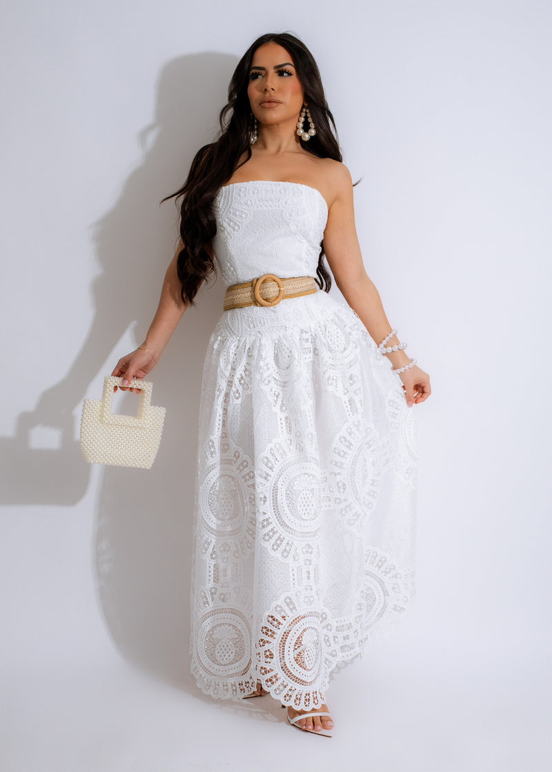 Beautiful white lace maxi dress with intricate detailing and flattering silhouette
