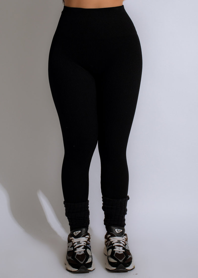 Black ribbed leggings designed for fitness activities and workouts