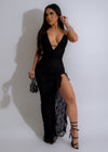 Black lace mesh maxi dress with a flowy silhouette for a chic and elegant look