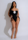 Unforgettable Days Swimsuit Black: A sleek, black one-piece swimsuit with a plunging neckline and high-cut legs, perfect for a day at the beach or poolside lounging