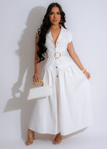 Alt text: A stunning white midi dress with a flowing skirt and elegant design