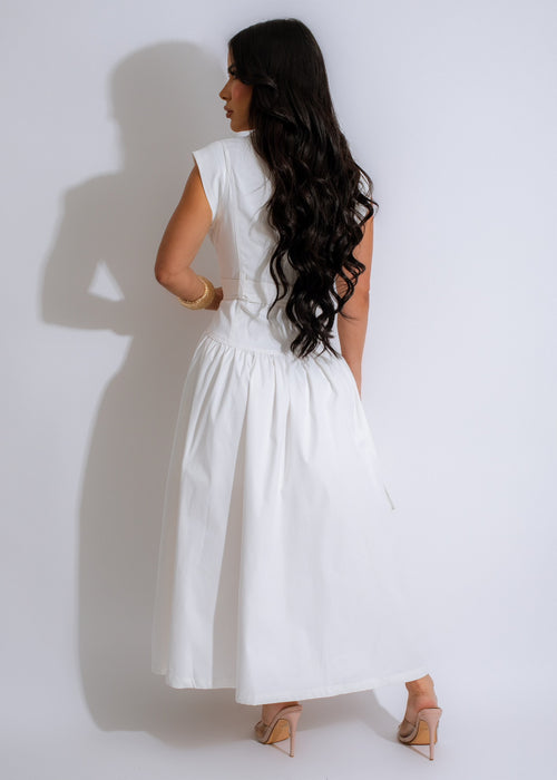 Beautiful white midi dress with a flattering fit and elegant design