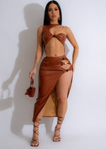 Alt text: Festival Flair Faux Leather Midi Dress Brown, a trendy and stylish outfit perfect for outdoor events and music festivals