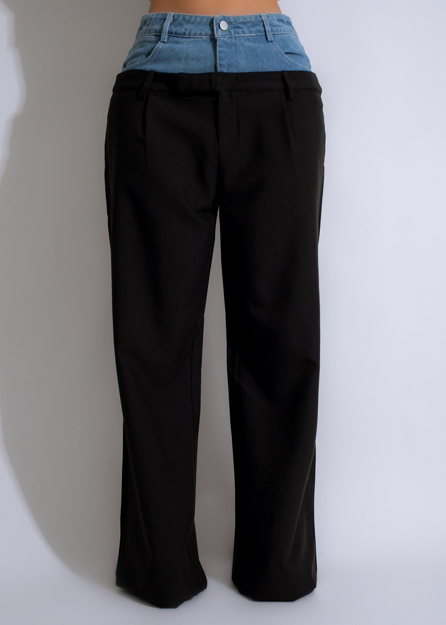 Comfortable and stylish black denim pants for women with a slim fit and classic design
