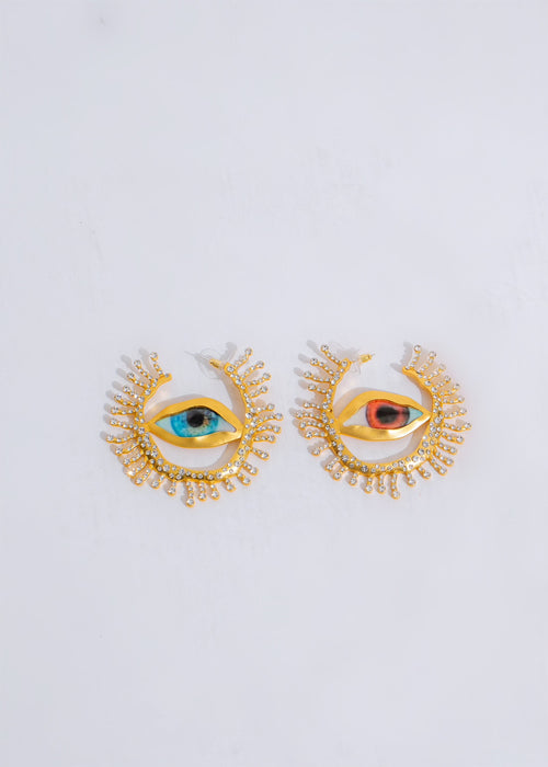 Shimmering gold earrings with delicate design, perfect for everyday wear