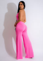 Just-Friends-Jumpsuit-Pink-in-multiple-sizes-and-colors-displayed-on-a-rack