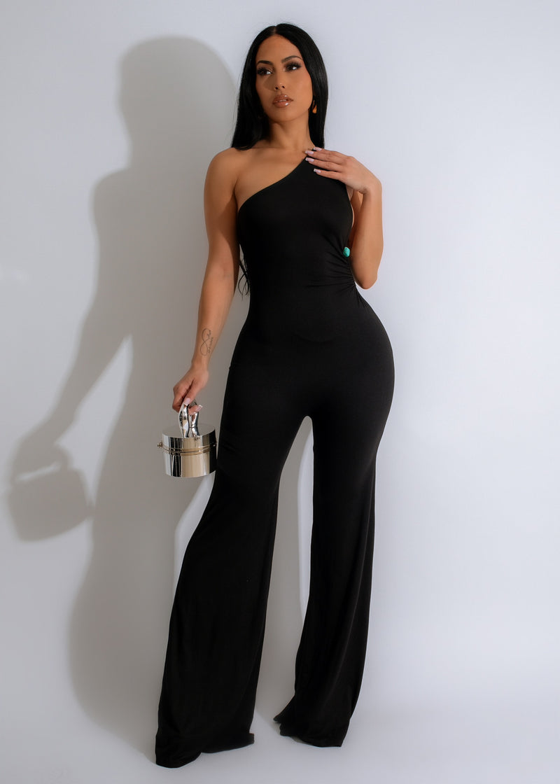 A full-length black jumpsuit with a flattering V-neck and wide-leg silhouette for a sleek and stylish look