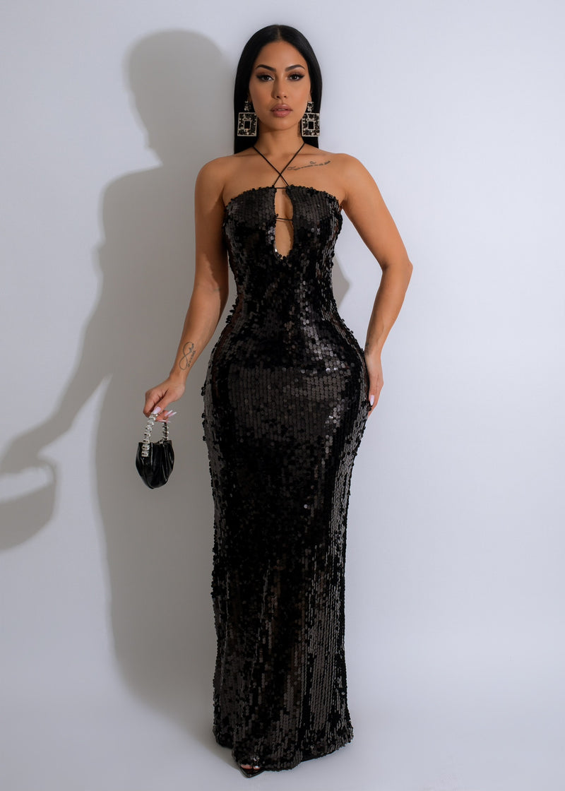 Elegant and timeless black sequin maxi dress for special occasions