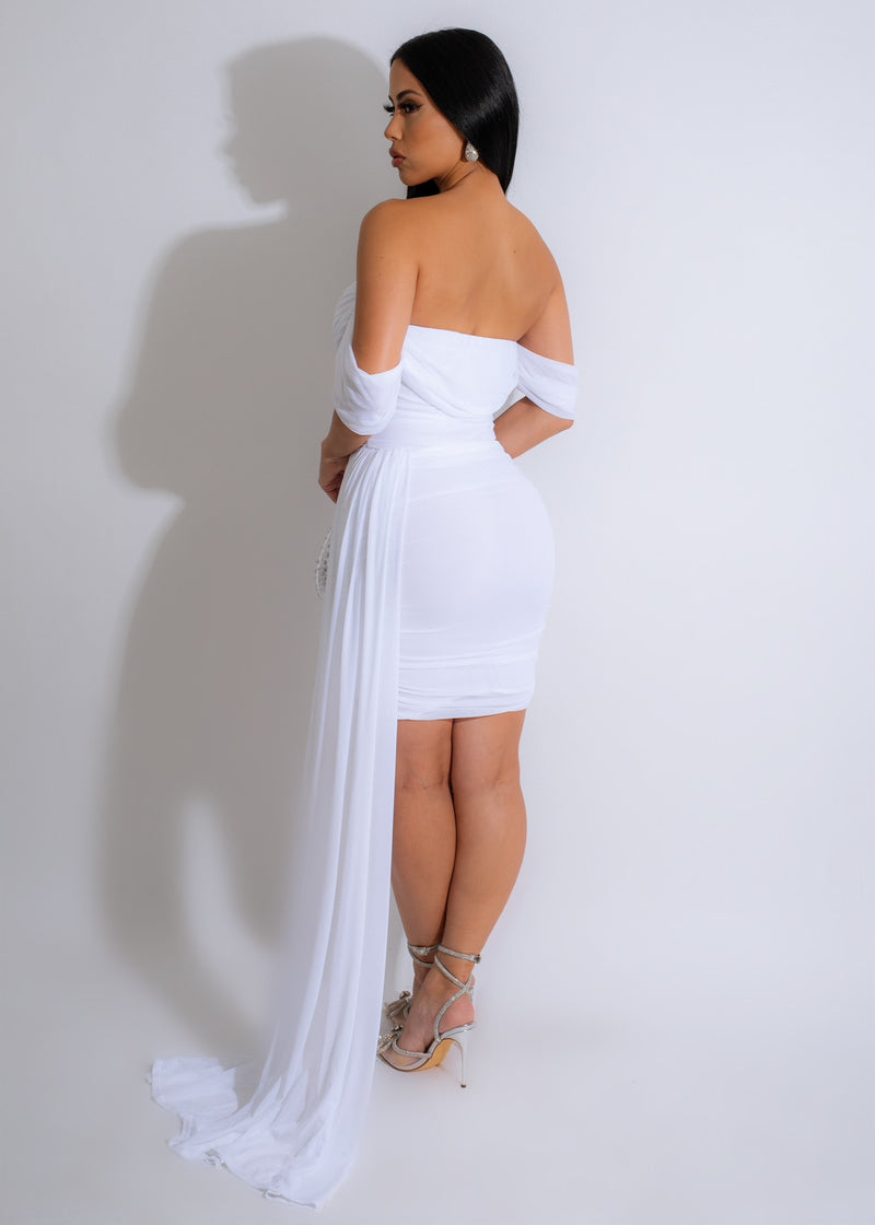 Stunning white mesh mini dress with elegant detailing and flattering fit