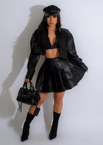 In My Element Faux Leather Skirt Set in black color, featuring a high-waisted skirt and a matching crop top with long sleeves, perfect for a night out or special occasion