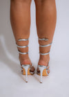 Shiny silver metallic heels with strappy design and closed toe