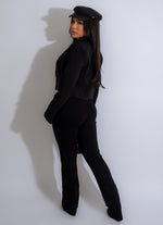  Fitted and edgy black pants with lace-up detail and high waist design