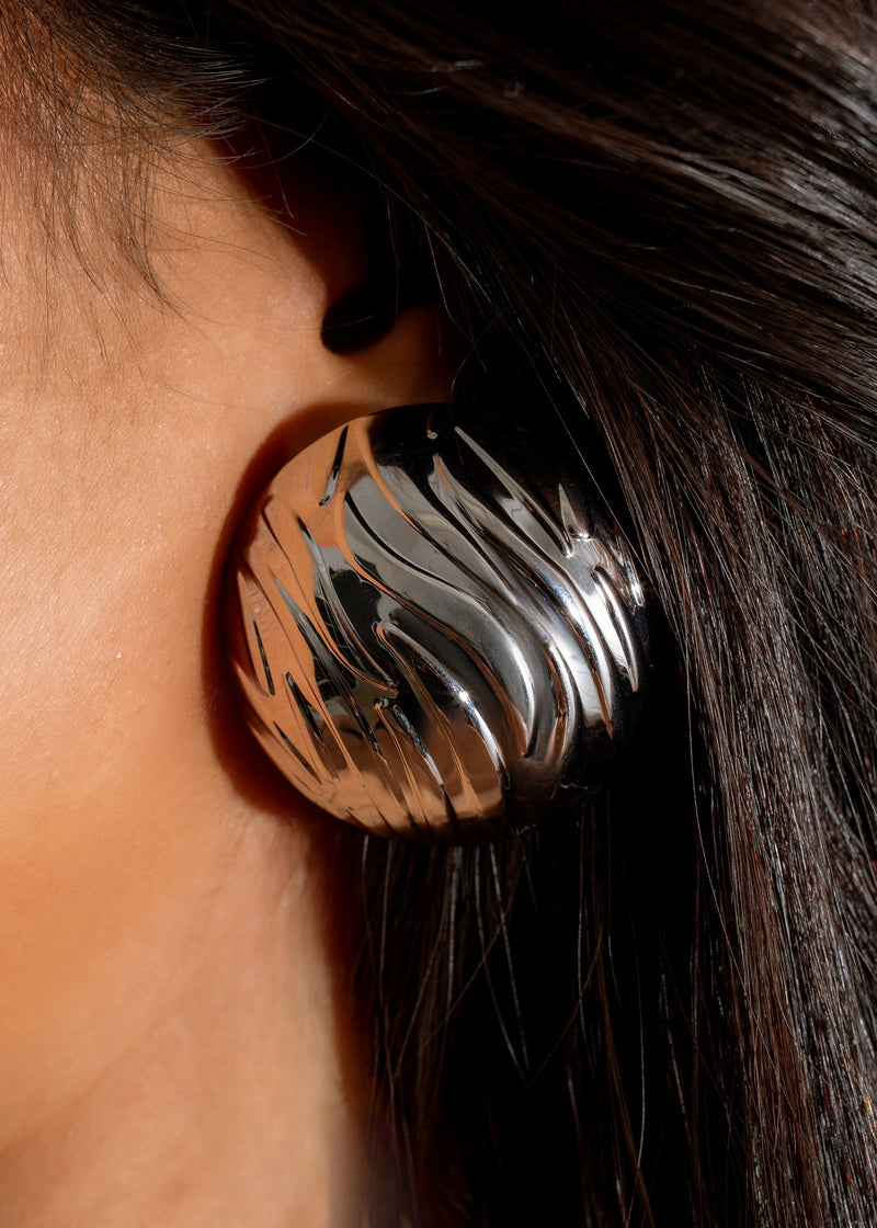 Shiny sterling silver drop earrings, a must-have accessory for every occasion