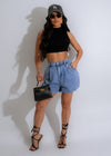 Graceful Piece Ribbed Crop Top Black worn by a stylish model with high-waisted jeans and statement earrings 