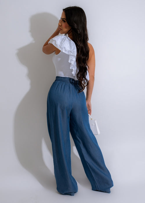 Pair of chic and comfortable Lovers Boho Pants Light Blue, featuring an elastic waist and wide legs