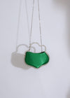  Elegant and sophisticated green handbag with spacious interior and adjustable shoulder strap