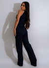 Dark denim jumpsuit with chain detail, perfect for a trendy and stylish look