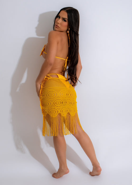Bright yellow Island Girl Fringe Cover Up being worn by woman