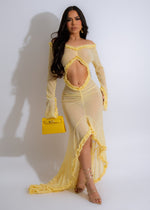Vibrant yellow mesh maxi dress with plunging neckline and flowing skirt