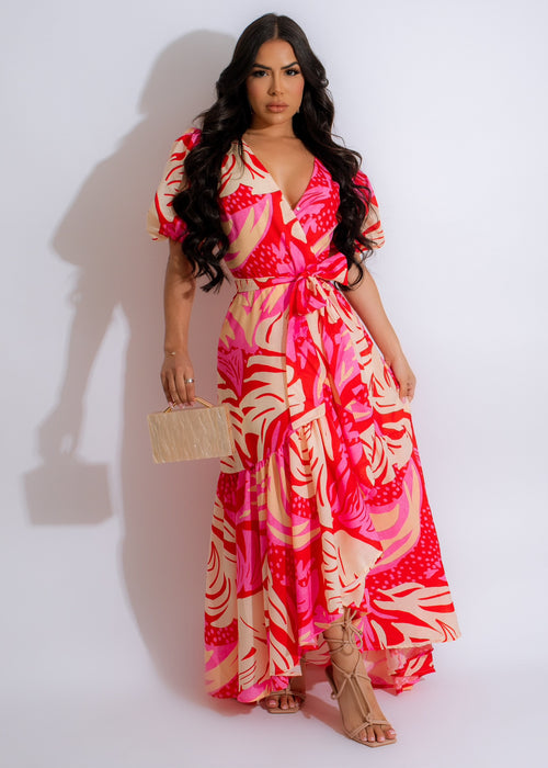 Floral Strength Maxi Dress Pink, a beautiful and elegant attire for spring and summer occasions, featuring a flattering floral print and a flowing maxi length