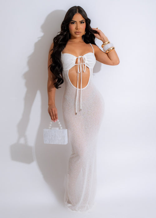 Stunning white knit maxi dress with intricate lace detailing and elegant silhouette