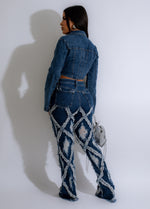  Fashionable Addicted To Us Distressed Denim Jeans in dark blue wash, styled with a rolled cuff and worn-in look