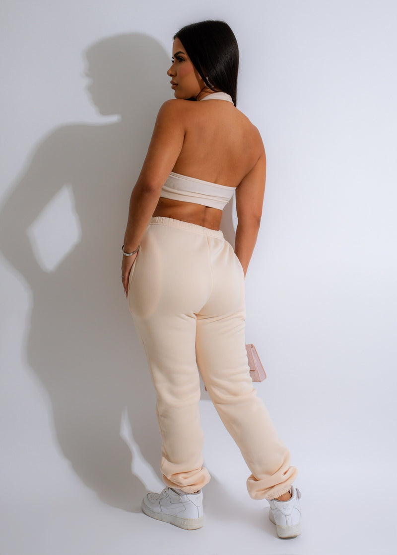 Alt text: A stylish and comfortable jogger set in a neutral nude color, perfect for lounging or running errands