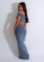 Two-piece skirt set featuring a ruched top and flowing skirt