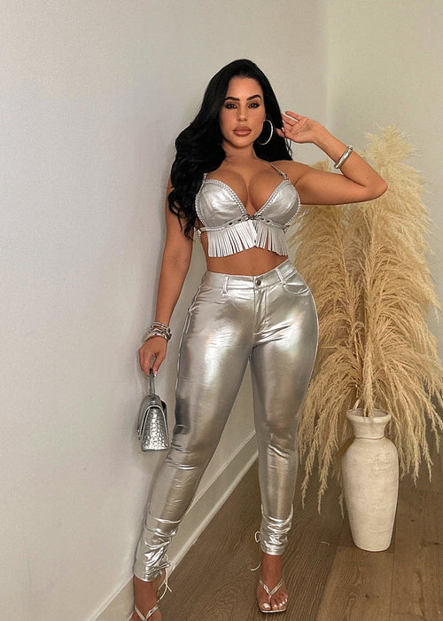 Shiny silver faux leather crop top with a hard-as-a-rock texture