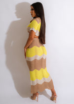A close-up image of a brown crochet skirt set with a matching top, perfect for a bohemian-inspired look